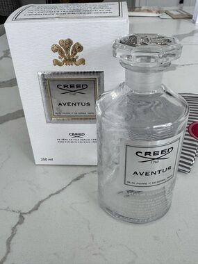 Creed Aventus decor Bottle (empty)- with History of Creed collectors book